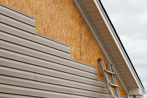 Professional Storm Damage Siding Repair technician working in Chadds Ford, PA